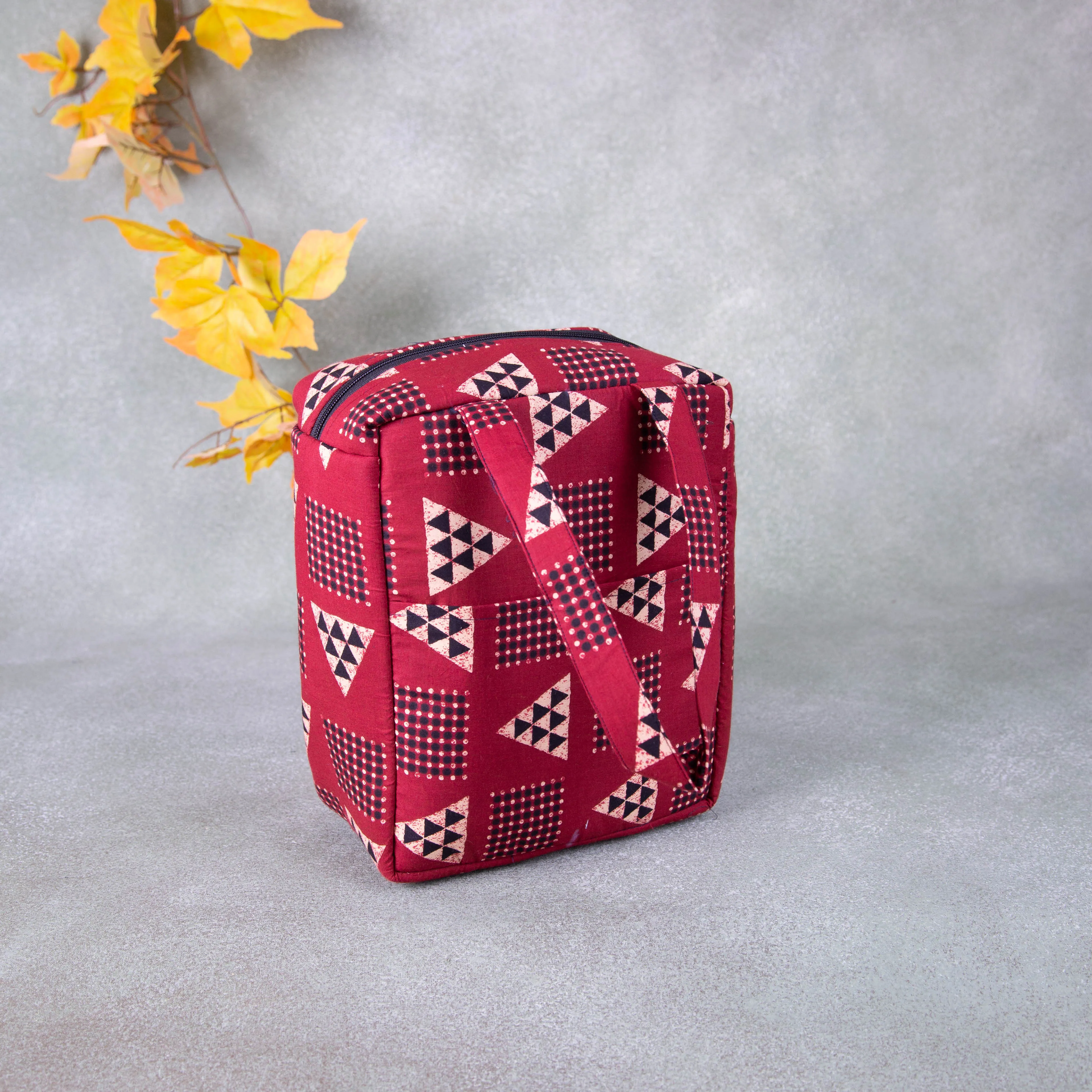 Water Proof Cotton Lunch Bag Red Colour with Small Black Triangle Design.